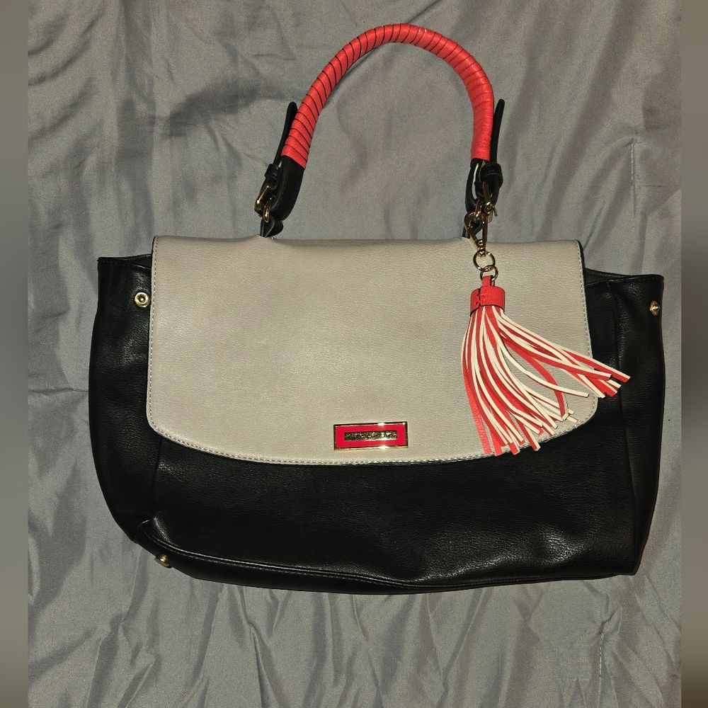 Stylish Black and Cream Handbag with Red Accents